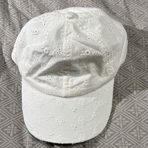 Carters white eyelet ball cap 2t-4t never worn. Velcro adjustable back